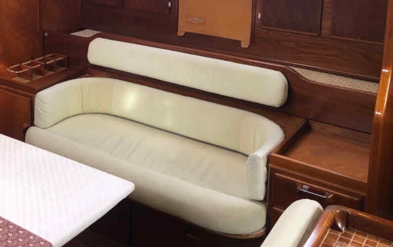 A small pull out bunk and uncomfortable settee